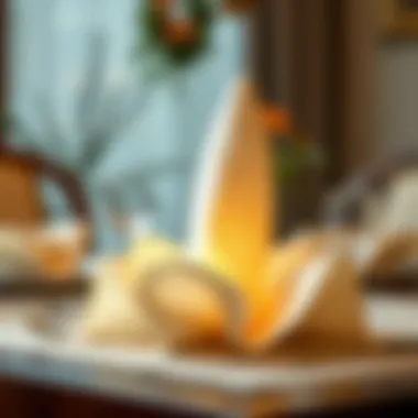 Elegant folded napkin centerpiece for dining table